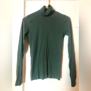 Kotn turtleneck in sage green older colorway barely worn